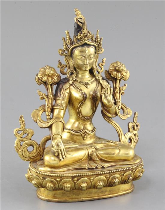 A Tibetan gilt bronze seated figure of White Tara, height 22cm